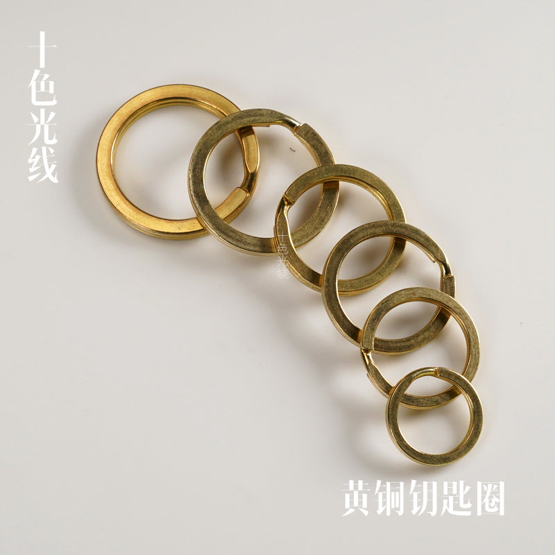 Solid brass key ring set with five round rings arranged in a chain