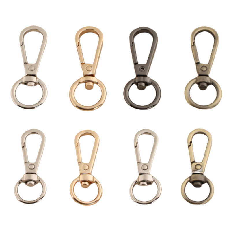 Swivel lobster claw hook buckle set with mixed silver, gold, and dark metal finishes