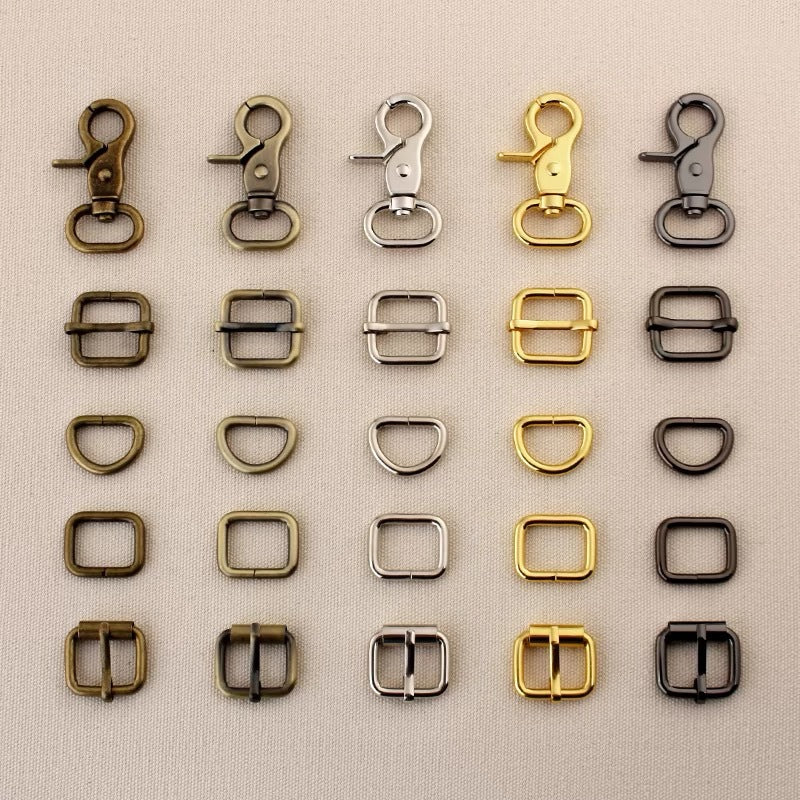 Bag hardware set lineup: swivel hooks, rings, D-rings, and buckles in multiple colors
