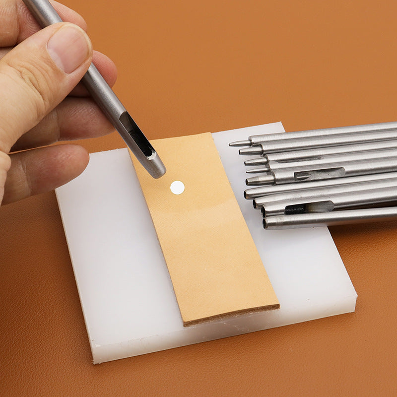 Handheld round hole punch tool with metal cutter, with spare punches