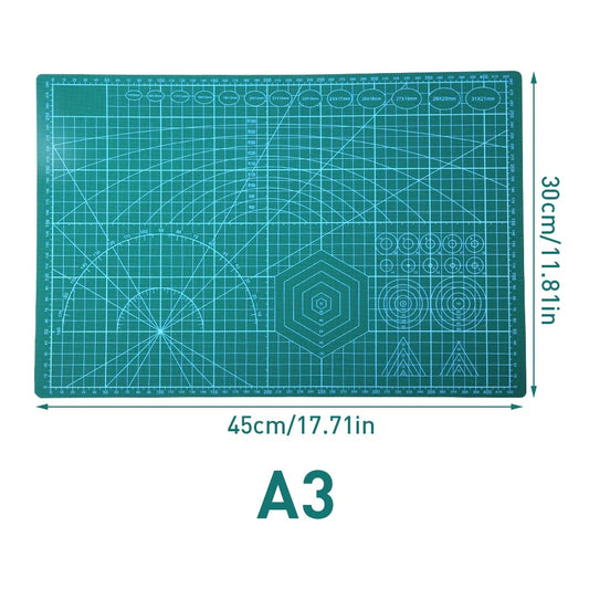 A3 self-healing cutting mat, teal grid with compass arcs and circle targets