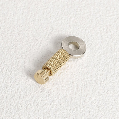 Brass leather positioning needle with silver ring, textured brass grip, and clamp tip