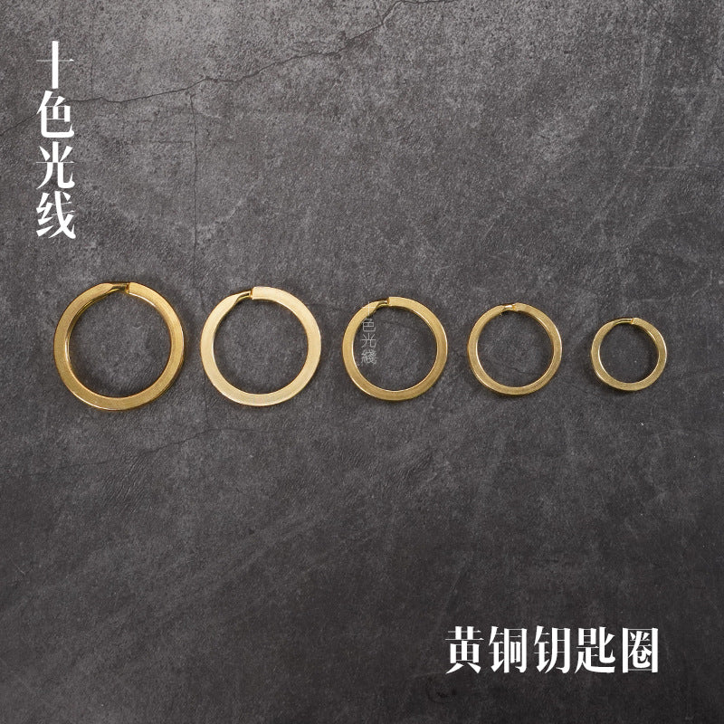 Solid brass key ring set, five round rings in size order, polished gold tone