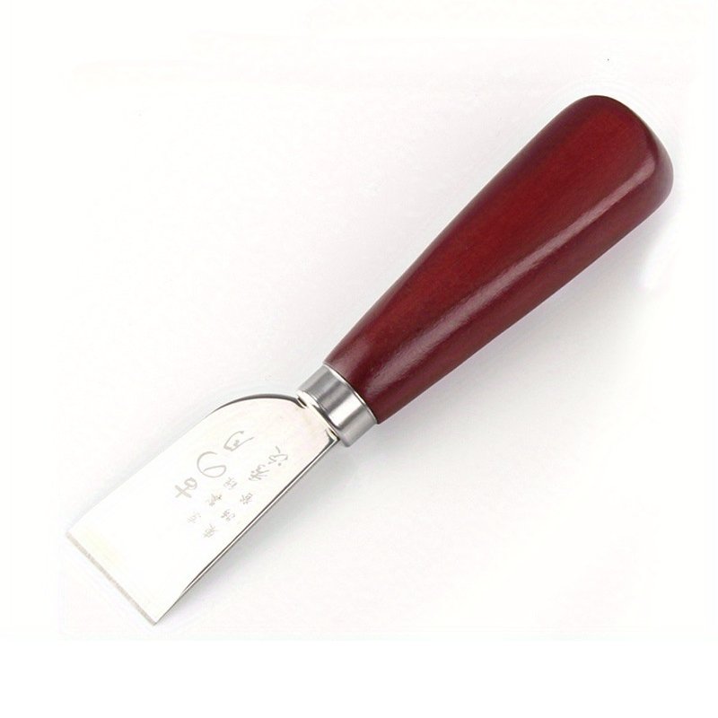 Leather cutting knife with dark red wooden ergonomic handle and rectangular metal blade