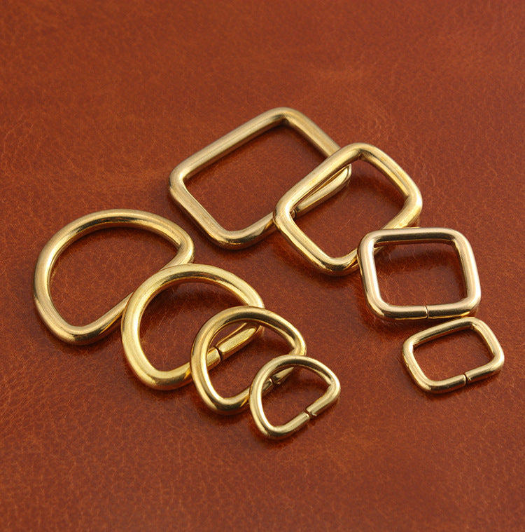 Brass D-ring and square buckle set, mixed shapes and sizes shown together