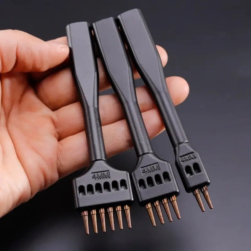 Black round hole punch tool set, three heads marked 4mm, 5mm, 6mm