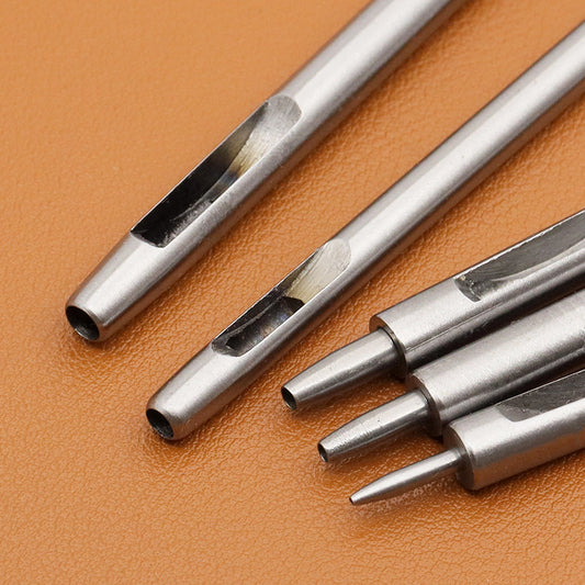 Assorted silver round hole punch bits with pointed tips