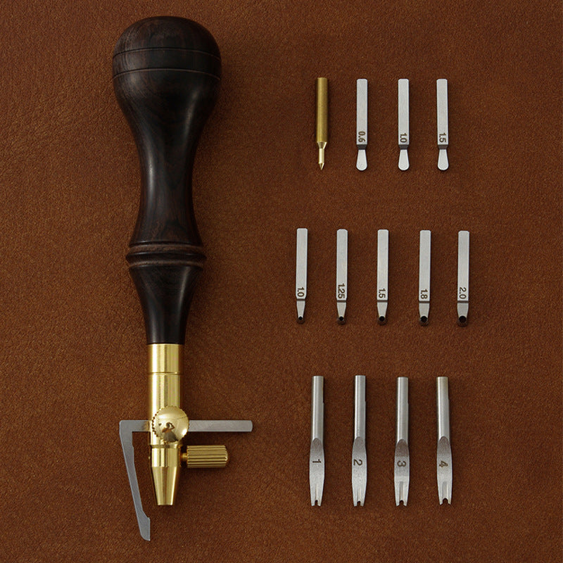 Leather edge cutter set with dark handle and multiple interchangeable cutting heads
