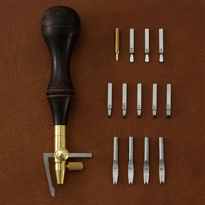 Leather edge cutter set with dark handle and multiple interchangeable cutting heads