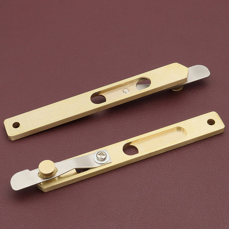 Leather line cutter with two long brass guides, metal blade and adjustment screws