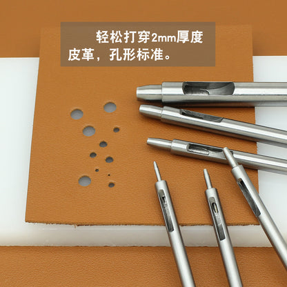 Leather hole punch set with round punches and sample holes on leather panel