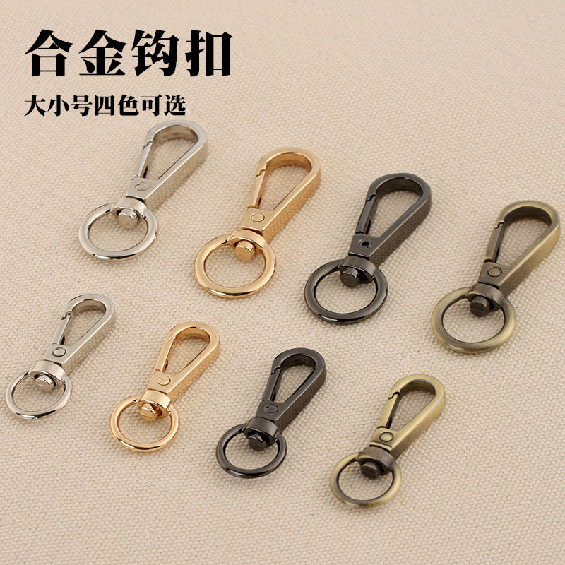 Assorted swivel lobster claw hook buckles in silver, gold, black, and antique tones