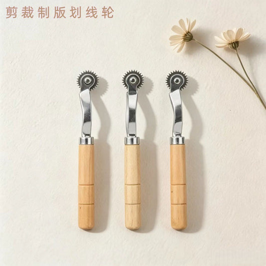 Wood-handled stainless steel tracing wheel tool for leather pattern marking