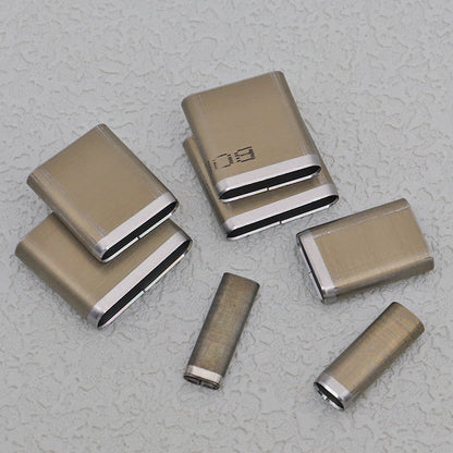 Mixed-size oblong slot punch die set with stainless steel blocks and black cutting faces