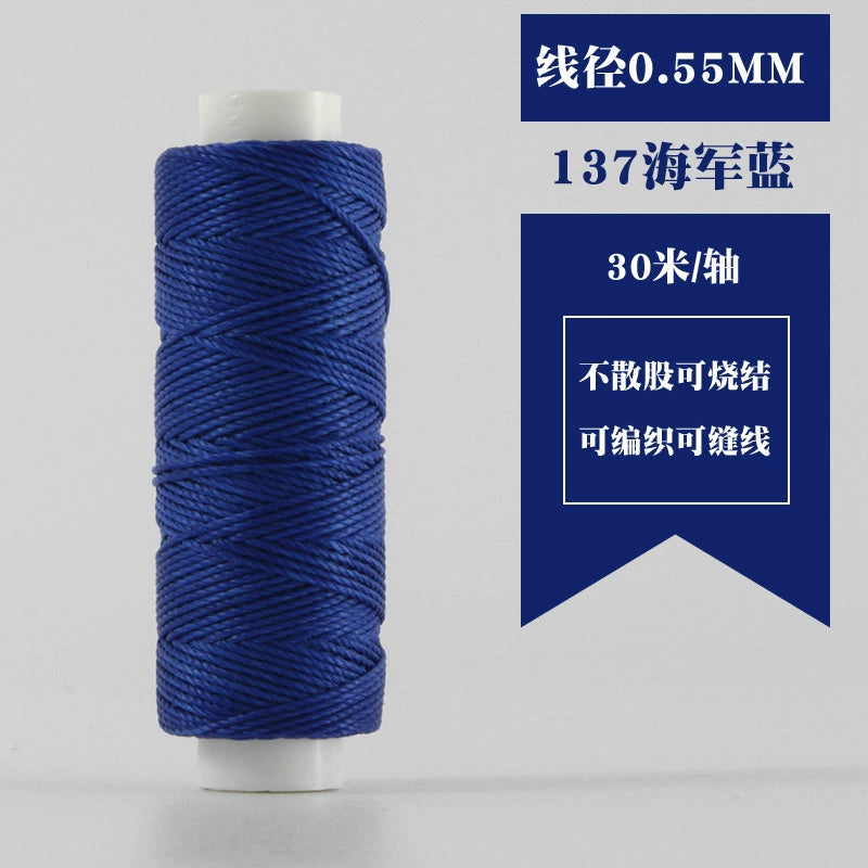 Waxed round thread spool in navy blue