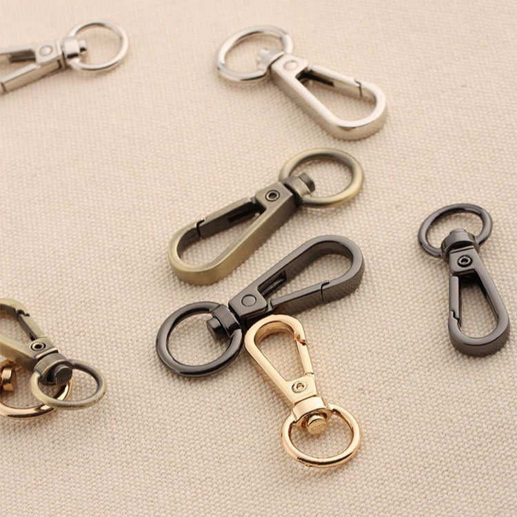 Assorted alloy swivel lobster claw hooks with round rings and spring clasps