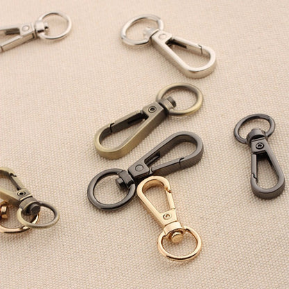 Assorted alloy swivel lobster claw hooks with round rings and spring clasps