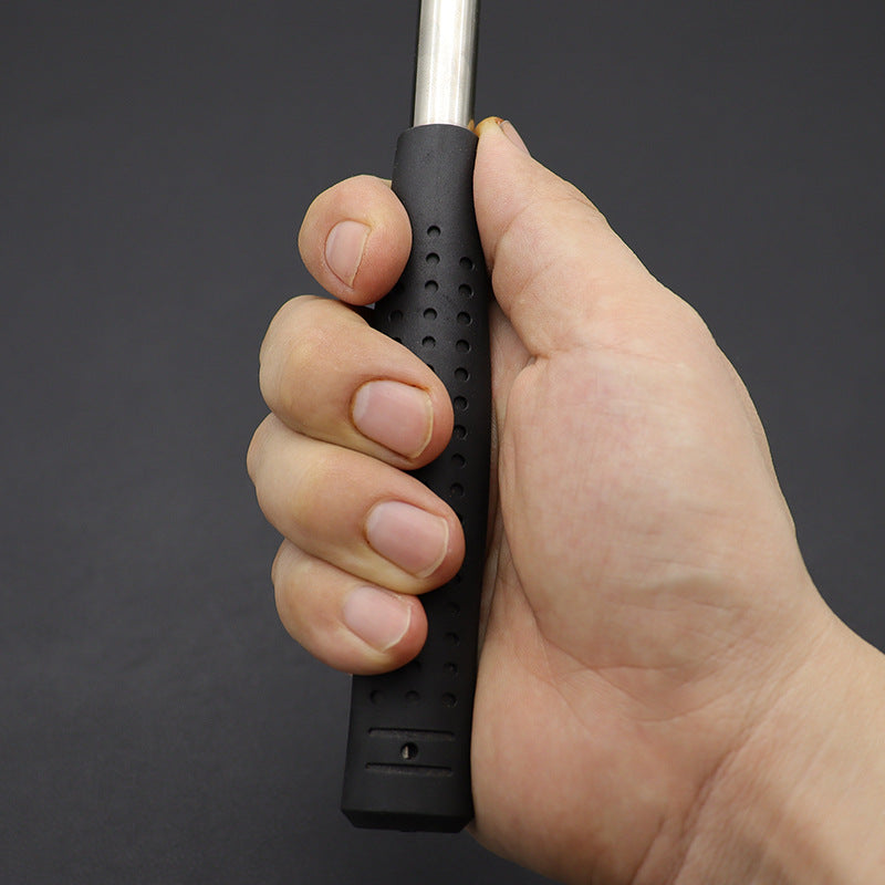 Rubber mounting hammer grip close-up with perforated black rubber and steel handle