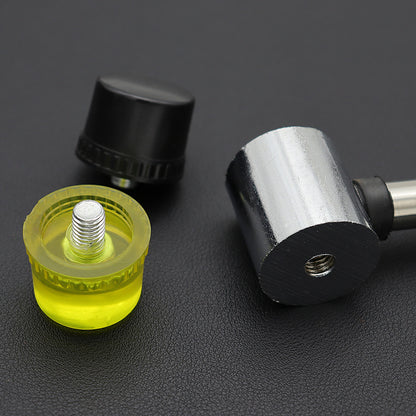 Interchangeable rubber mallet heads, yellow and black, with metal inserts