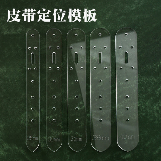 Clear acrylic belt hole punching templates with size markers and punched hole rows