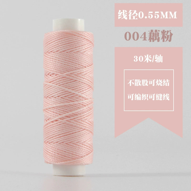 Waxed round thread spool in light pink