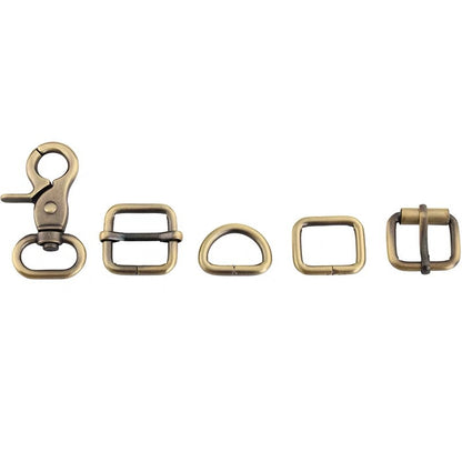 Bag hardware set metal pieces: swivel clasp, square ring, D-ring, and roller buckle