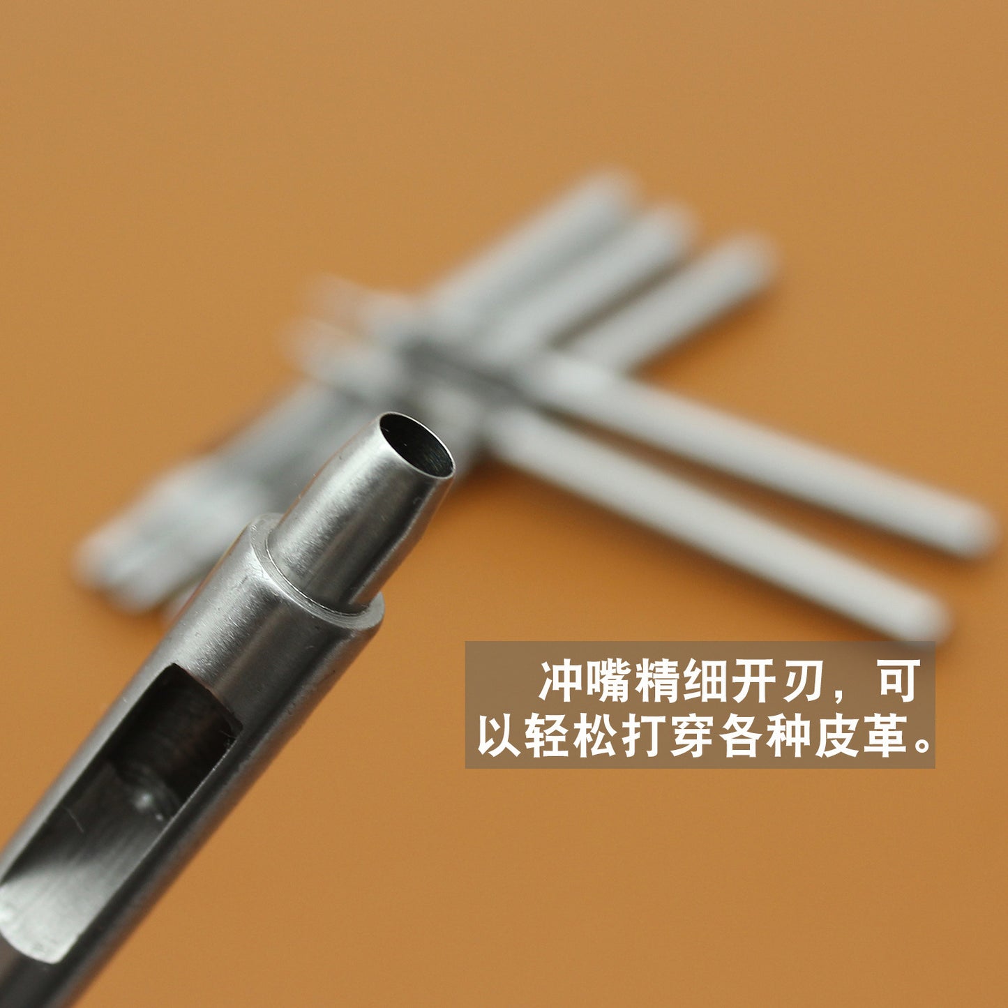 Round punch tool head with circular cutting tip and silver steel handle