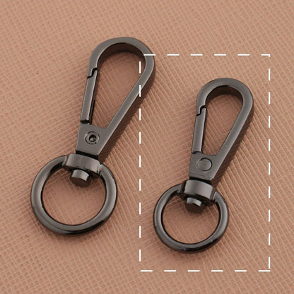 Swivel lobster claw hook buckle in gunmetal and silver-tone metal with round rings