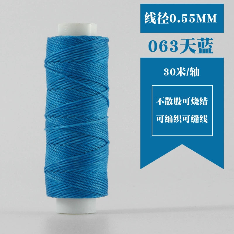 Waxed round thread spool in bright blue