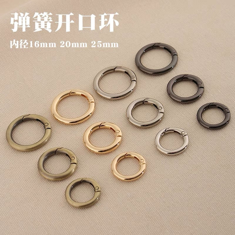Assorted zinc alloy spring open split rings in silver, gold, gun metal, antique
