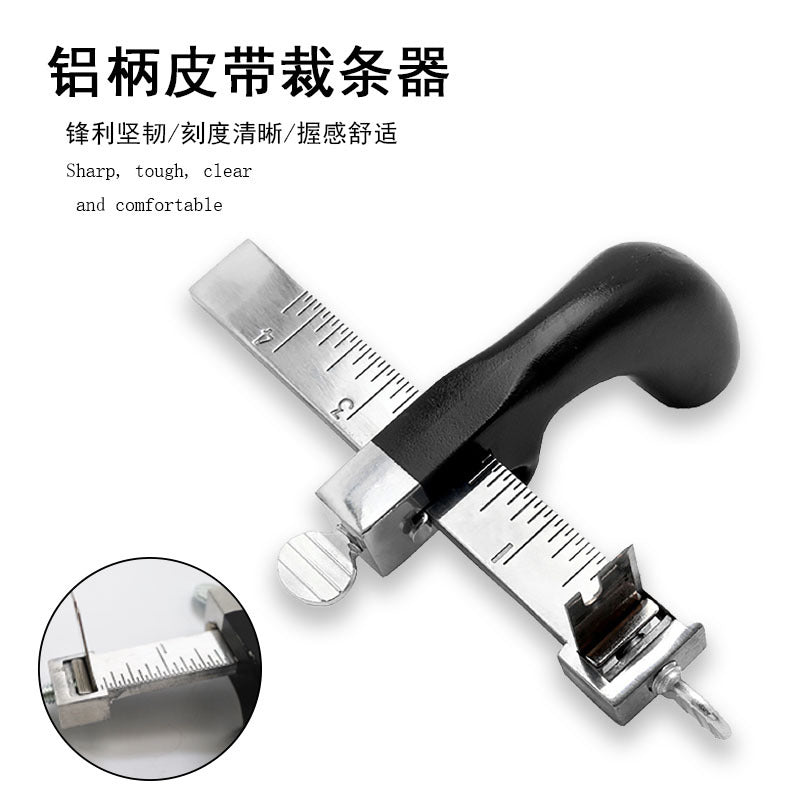 Leather strap cutter tool with black handle, metal frame, and ruler guide scale