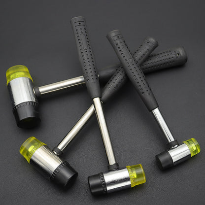 Rubber mounting hammer set with four black rubber grips and steel handles with yellow caps