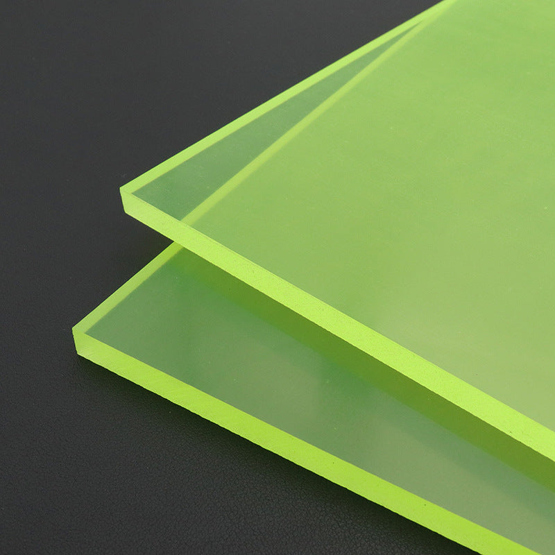 Neon green punching pad board with visible layered sides and straight beveled edge