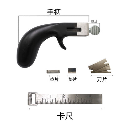 Leather strap cutter tool with black handle, blade inserts, and length ruler scale