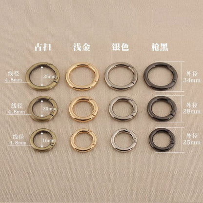 Zinc alloy spring open split rings in silver, gold, gun metal, and dark finishes