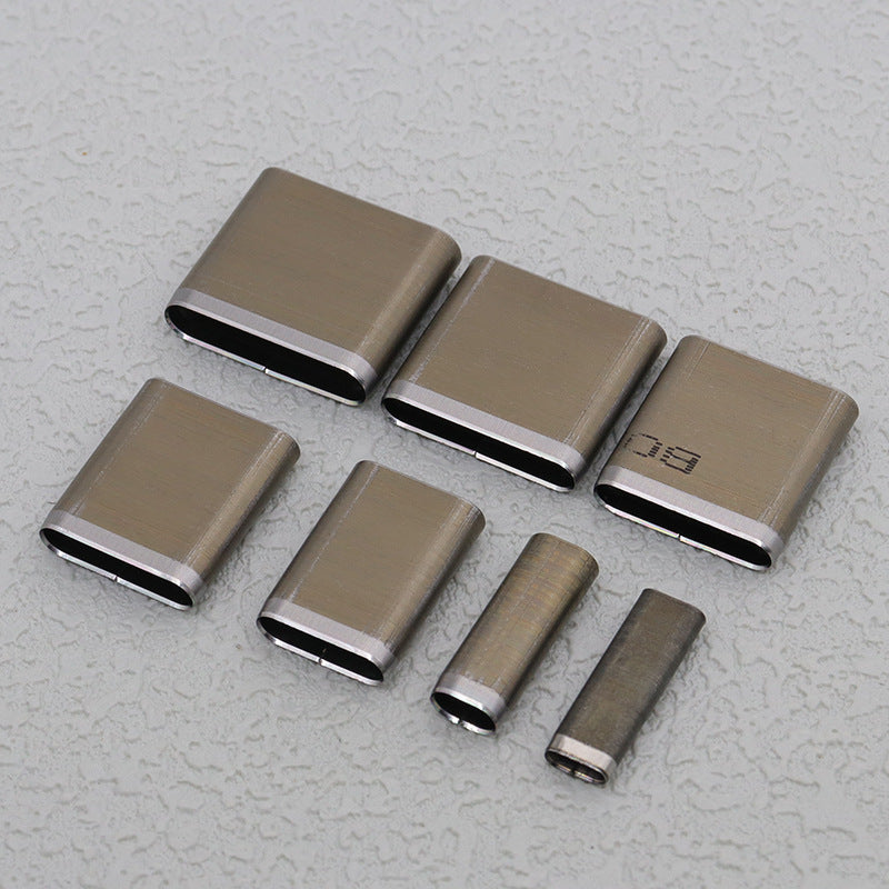 Oblong slot punch die set, multiple steel cutter blocks with open black cutting edges