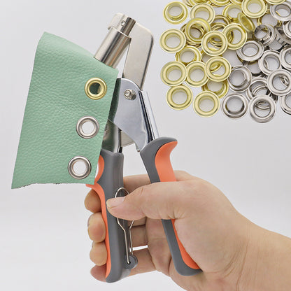 Eyelet setting pliers with orange-gray handles, pressing grommets into mint leather