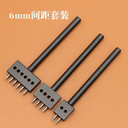 Three-piece leather hole punch set with black handles and round-hole metal dies