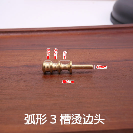 Brass edge burnisher tip with pointed end; 49.2mm length, 4.5mm tip width