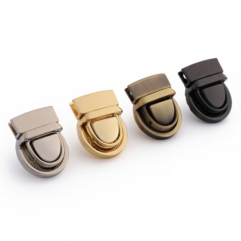 Metal twist-lock bag buckle set with silver, gold, gunmetal and dark finishes