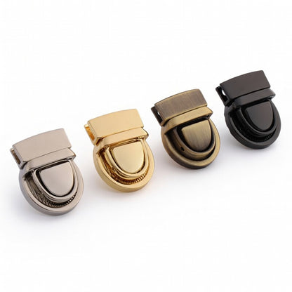 Metal twist-lock bag buckle set with silver, gold, gunmetal and dark finishes
