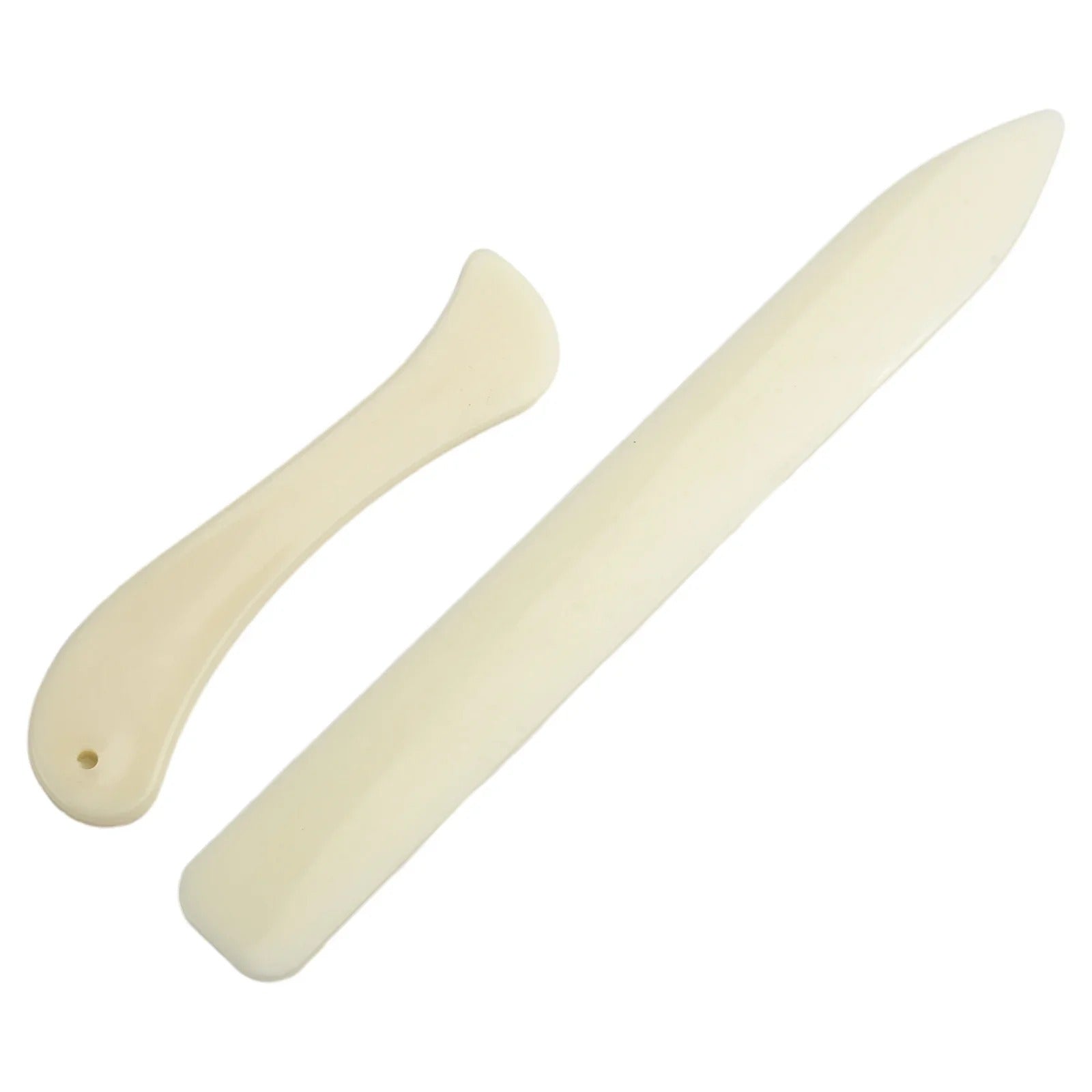 Leather bone folder set, cream color, two curved smoothing tools with small hole.