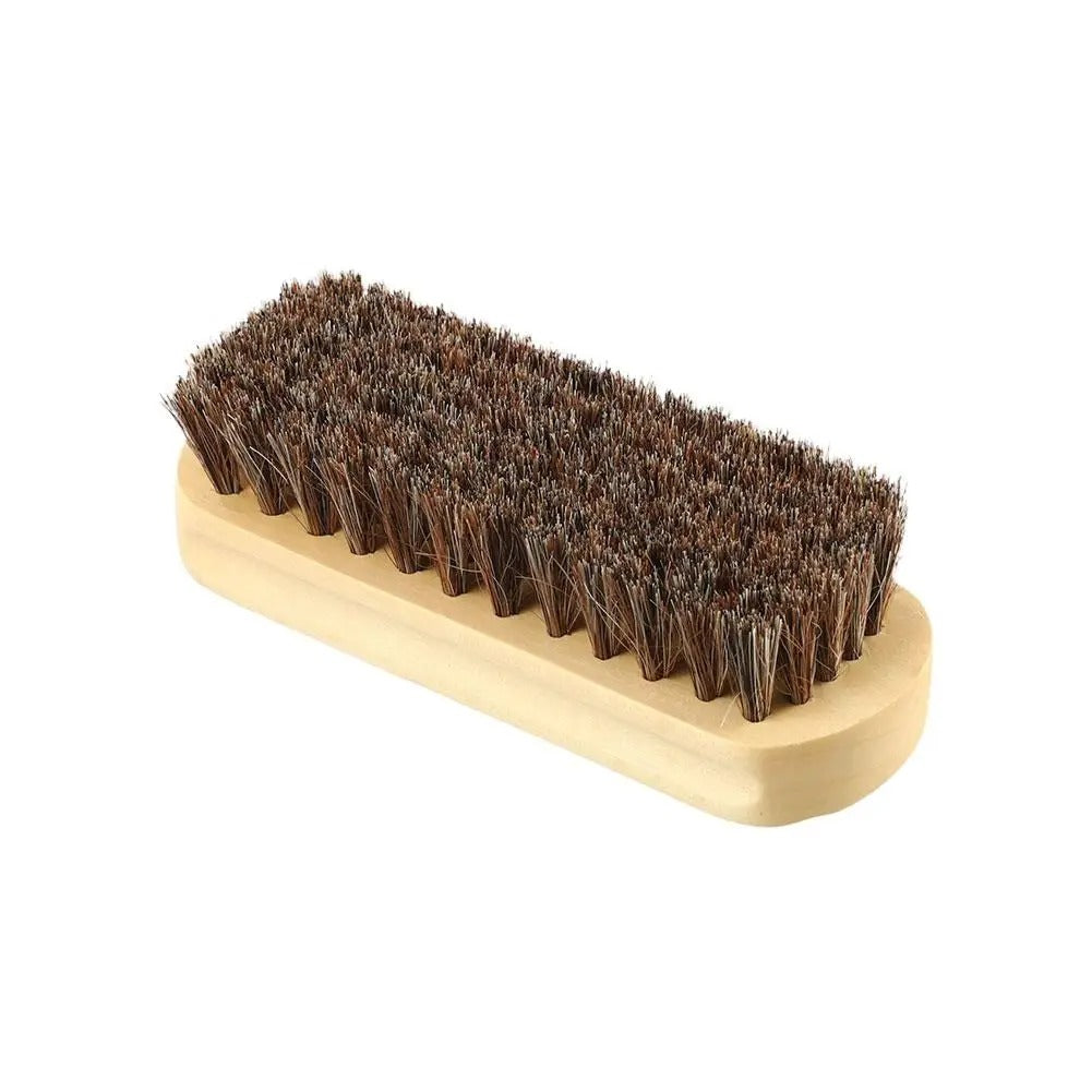 Horsehair brush with light wooden handle and dense brown bristles