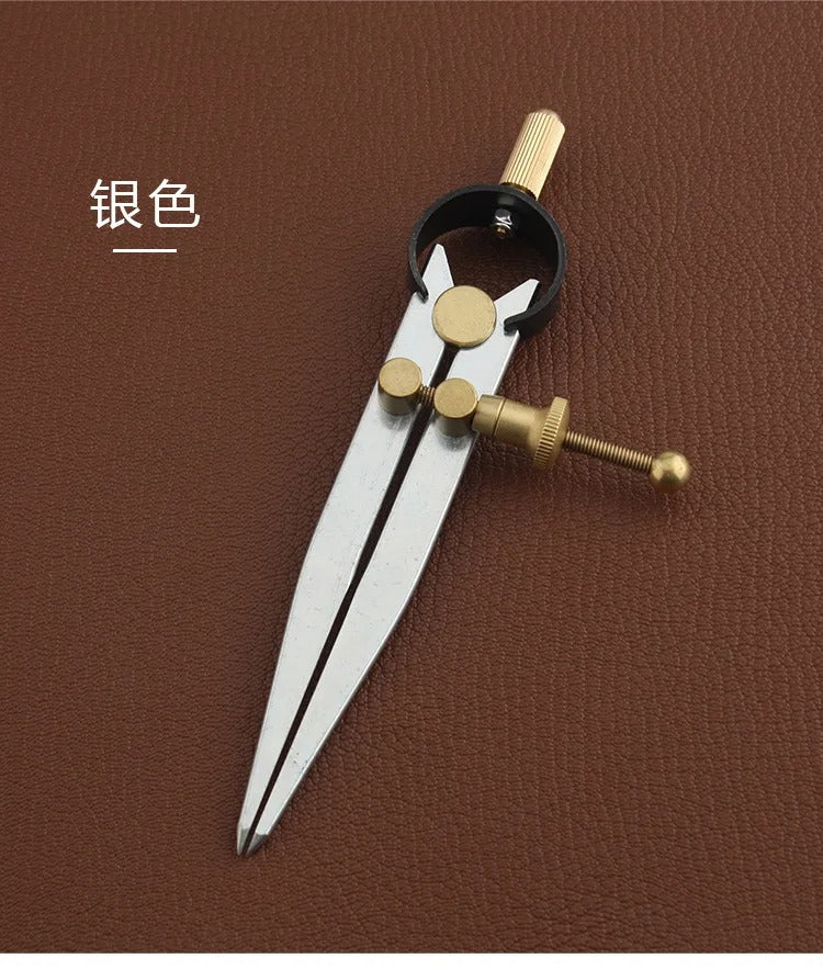 Wing divider with lockable adjustment, metal legs with brass fittings and knurled thumb wheel