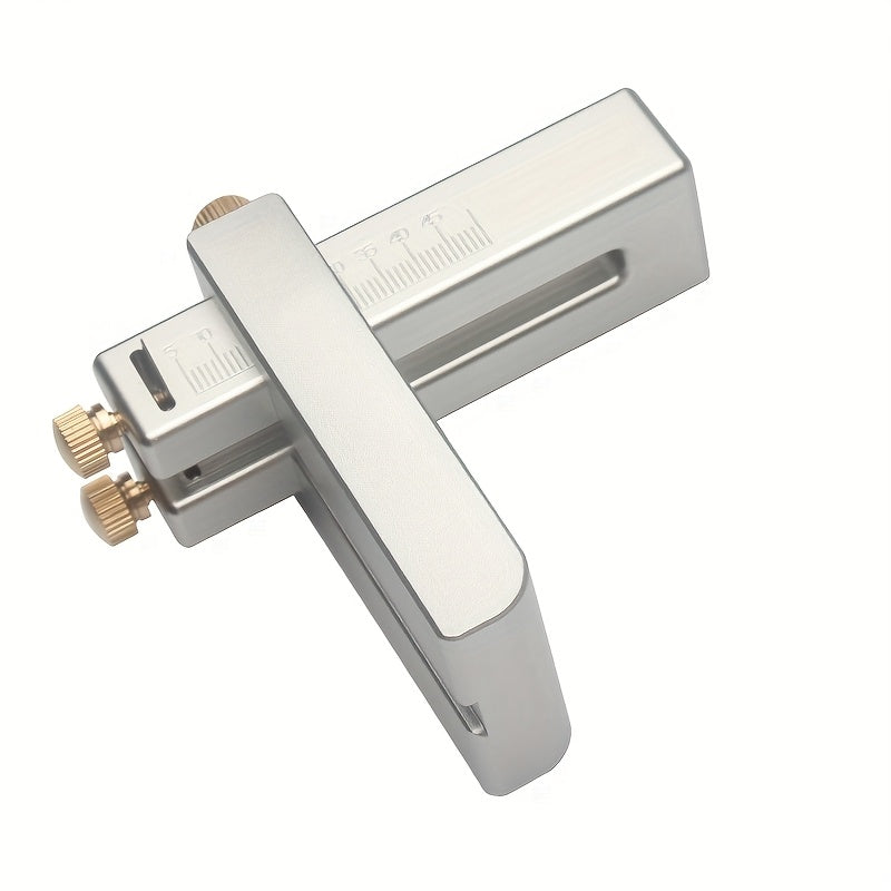Precision leather strap cutter with silver handle, brass knobs, and measurement scale