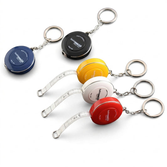 Retractable cloth tape measure keychain with colored housings (blue, black, yellow, white, red)