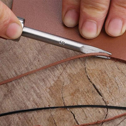 Leather edge beveler tool shaping a leather seam edge with metal blade